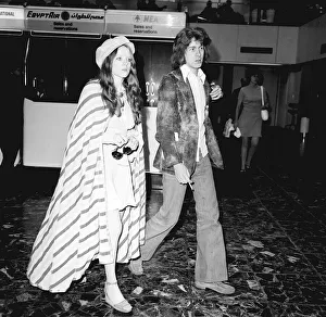 Core51 Prints: Rolling Stones. Mick Taylor and girlfriend Rose Miller at Heathrow Airport