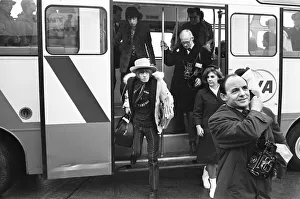 00373 Prints: The Rolling Stones seen here at London Airport embarking on a flight to New York