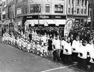 Roman Catholic procession through the streets of Cardiff making their way to the Castle