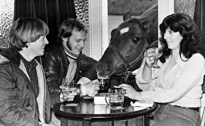 Roman Crumpet the Drinking horse shares a pint with his owners 1977