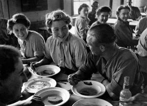 Canteens Prints: Is it romance at the dinner table? Scene at a mixed a Battery in the London area