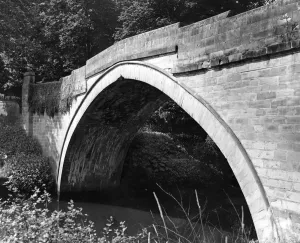A romantic small stone bridge in the ground of Lambton Castle which has a beauty all its