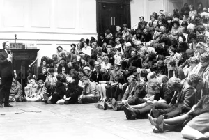 Romark, the hypnotist puts his subjects to sleep on the stage of the City Hall in