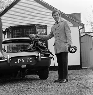 Ron Atkins the Steeplechase jockey who wears mod gear, about to set off for the races
