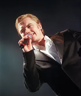 Ronan Keating singing during concert in Glasgow December 1999