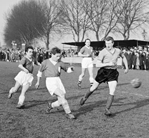 Spectators Prints: Ronnie Corbett far left assists Alfie Bass in the TV All Stars XI attack on Lebus