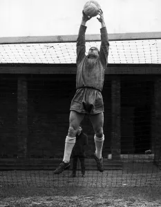 00994 Prints: Ronnie Simpson goalkeeper jumping to catch football at goalmouth Circa 1967