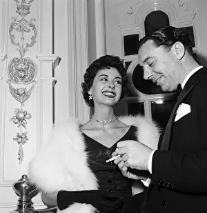 Cigarette Prints: Ronnie Waldman and his wife Lana Morris attend the first night of