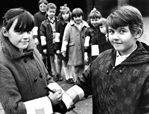 Rosemary Pape and Margaret Milton are pictured wearing armbands made at Bolam Street