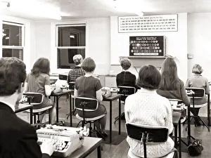 Typewriter Prints: Rosemary park aged 16 sits in a happy trance at her typewriter her eyes fixed on flashing