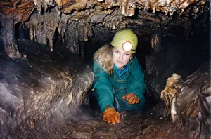 01044 Prints: Rosie Waller, Newcastle Chronicle feature writer exploring a local cave