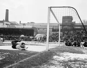 00432 Prints: Rotherham United goalkeeper Ron Ironside makes a flying save during the FA Cup match