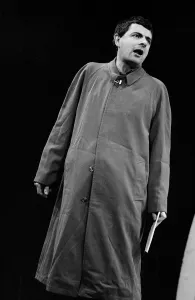 00003 Prints: Rowan Atkinson during Royal Variety show rehearsals 1984 in raincoat