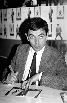 Rowan Atkinson sign copies of a Mr Bean video at HMV music store in Oxford Street