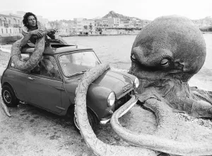 Roy Bella in a Mini battles with an Octopus on beach in Malta stars in film Seven Cities