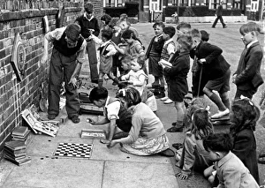 00017 Prints: Roy Hancock and Donald Baker run sideshows in the streets of Ashford to collect money for