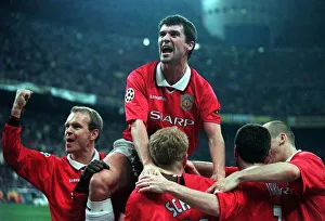 Roy Keane Manchester United midfielder March 1999 celebrates with teammates after striker