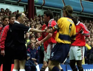 ROY KEANE IS RESTRAINED BY TONY ADAMS AFTER DISALLOWED GOAL FOR OFFSIDE IN THE FA CUP