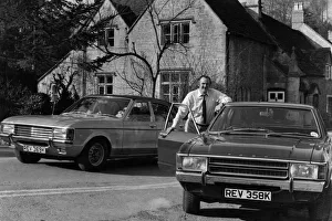 00042 Prints: Roy Spicer drives the New Ford Consul through Britains Loveliest Village