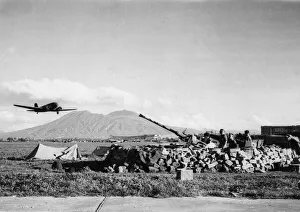 Guns Prints: The Royal Air Force Air Transport service follows closely the advance of the Allied