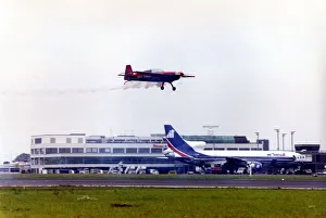 Aerobatics Prints: Royal Jordanian Falcons display team land in their Extra EA300 aircraft after performing