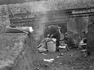 Royal Marines preparing a meal of Bully Beef at the earthwork defences