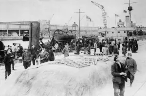 One of the Royal Navy Humber class river monitors seen here tied up to the quayside in