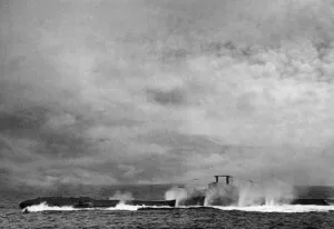 Submarines Prints: Royal Navy submarine HMS Thunderbolt doing a crash dive at sea during the Second World