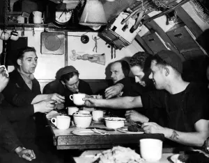Conversation Prints: Royal Navy at War. Members of the crew gather in the submarine mess room