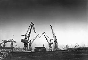 Cranes Prints: The Royal Navys aircraft carrier HMS Illustrious seen here under construction