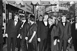 Tuxedo Prints: Royal premiere of The Beatles new film Help! at the London Pavilion in Piccadilly circus