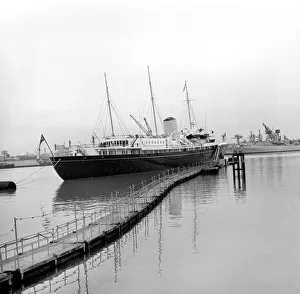 Yacht Prints: The Royal Yacht Britannia seen here at the Royal Naval Dockyard Portsmouth