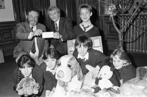 00523 Prints: Royds Hall High School head Peter Clarkson presenting 40 cheque to NSPCC for their
