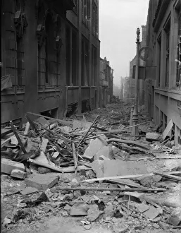 Rubble strewn across Weaman Street following a heavy raid on Birmingham