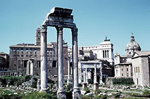Ruins of the Temple of Castor and Pollux looking towards Arch of Septimius Severus Italy