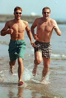 Shades Prints: RUNNING BEARS PAUL WEARS SHORTS BY MOTO MARK WEARS SPEEDO CHECK SHORTS