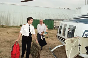 Rupert Murdoch getting in to a helicopter. 6th August 1994