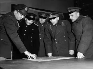 01454 Prints: Russian Air Force visitors refer to an air chart for a discussion of air tactics