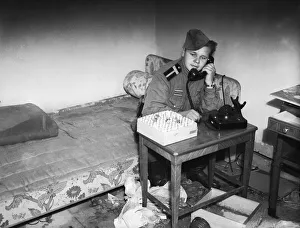 Soldier Prints: Russian officer making a phone call in the ruins of the Reich Chancellery, Berlin