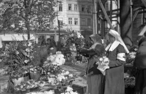 Russian Red Cross nurses seen here in the market place in Lemberg buying flowers for