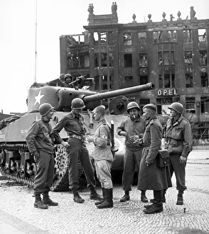 Allies Prints: Two Russian soldiers talking to US soldiers as the first American tanks roll into