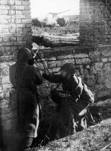 Russian tank destroyers directing their deadly fire at oncoming German tanks during