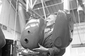 Saddle tanks for BSA motorcycles on the production line at the BSA Factory, Small Heath