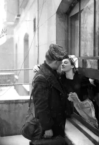 Sailor kissing a Girl goodbye as he leaves for the active service Women fulfilling