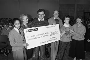 Cheque Prints: Salendine Nook High School raised £850 in a sponsored swim for a minibus appeal by