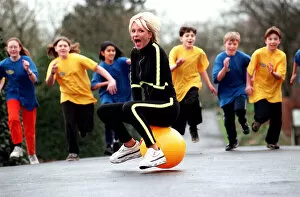 Images Dated 25th March 1998: Sally Gray TV Presenter of the new 50 / 50 childrens show on a space hopper - March 1998