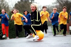 Sally Gray TV Presenter of the new 50 / 50 childrens show on a space hopper - March 1998