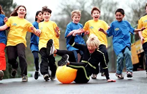 Sally Gray TV Presenter of the new 50 / 50 childrens show on a space hopper - March 1998