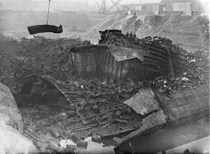 Salvage work in progress on the remains of the munition ship Malakand (Brocklebank Line