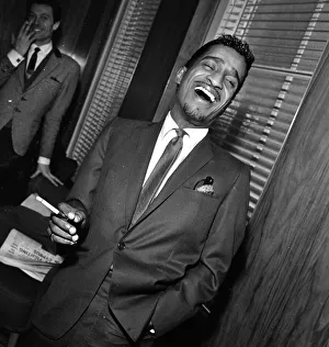 Sammy Davis Jnr at a press reception in Soho cinema showing slips of his new film Robin
